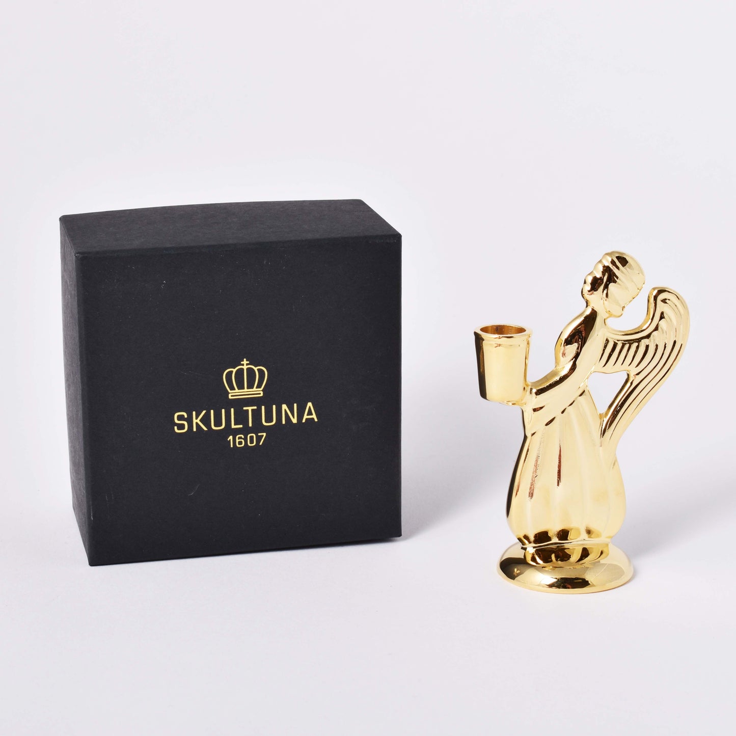 Ljusstake Skyddsängeln i förgylld mässing i design av Carl-Einar Borgström med förpackning