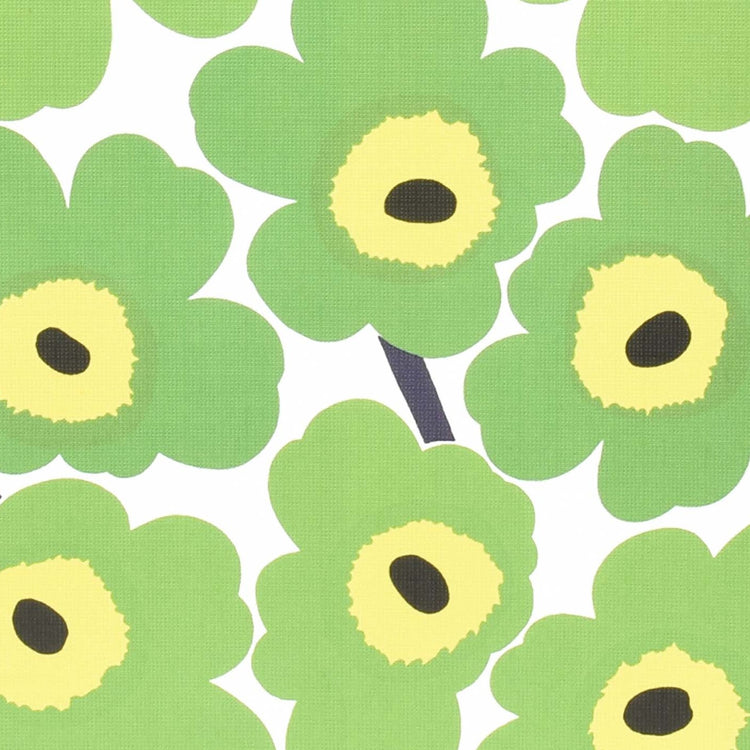 Mönstret Unikko från Marimekko i grönt och gult