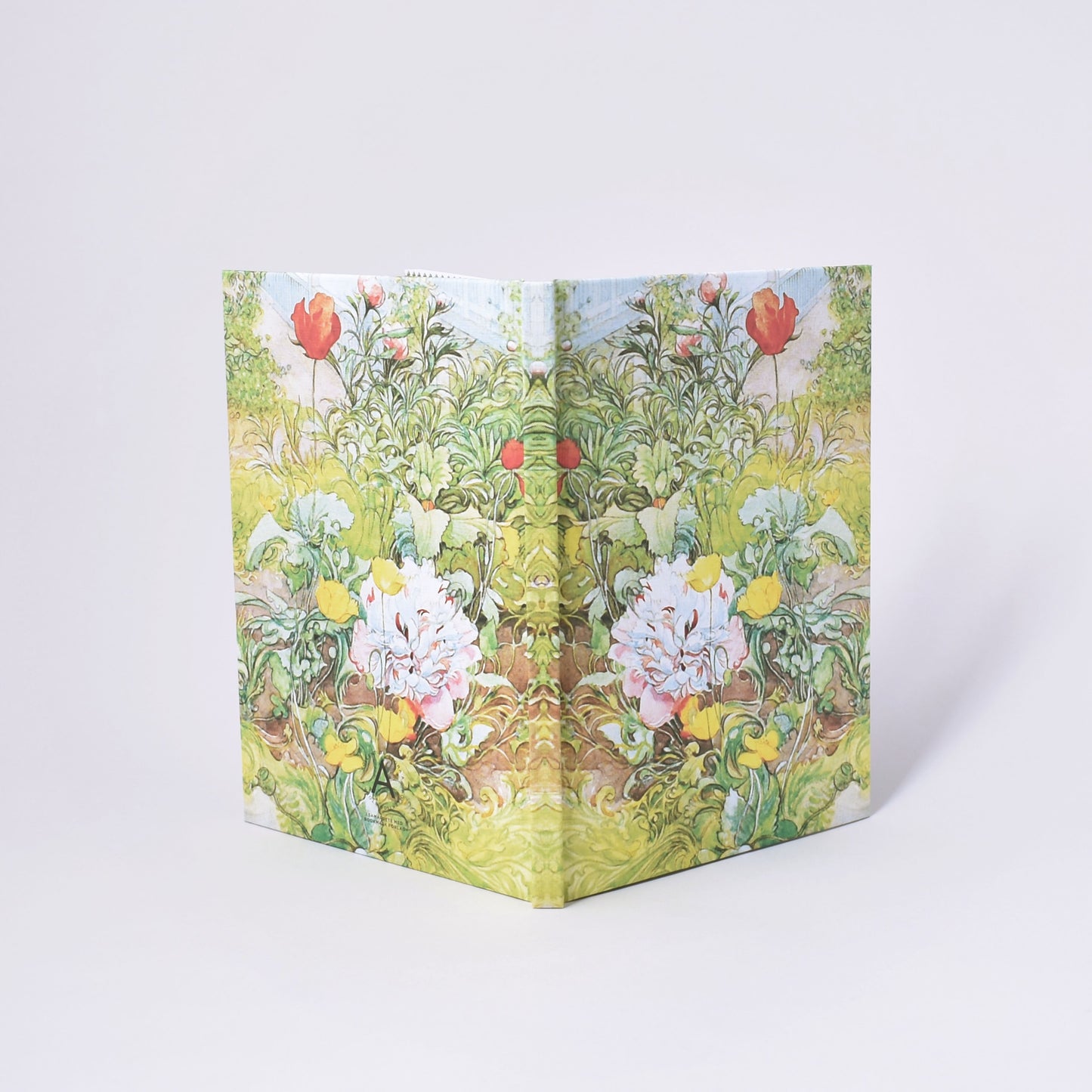 Anteckningshäfte med linjerat papper och Carl Larssons målning Sommar i Sundborn