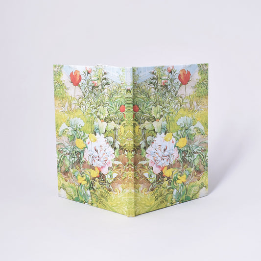 Anteckningshäfte med linjerat papper och Carl Larssons målning Sommar i Sundborn