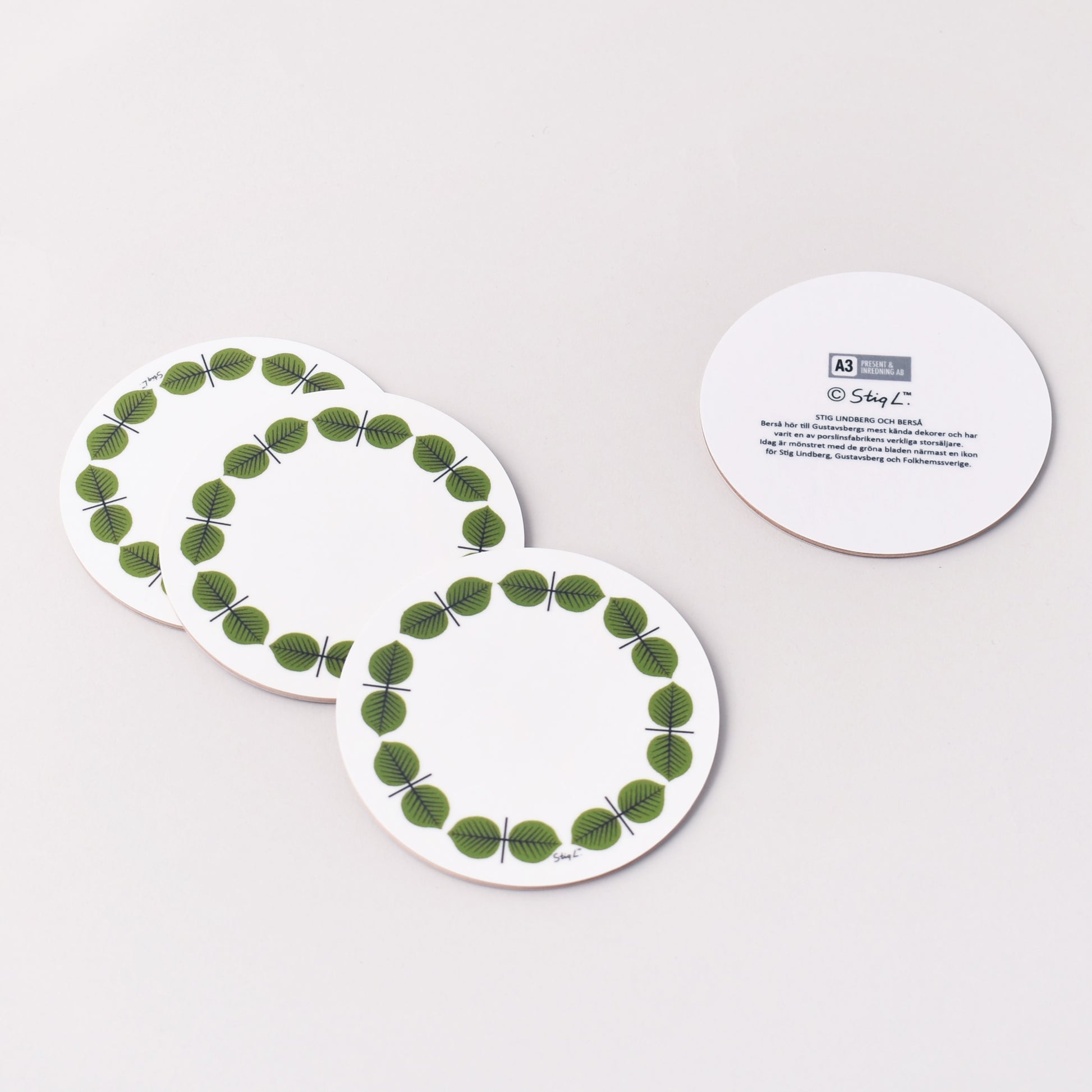 fyra glasunderlägg med Stig Lindbergs Berså