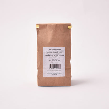 Te i brun påse med apelsinskal och kanelbitar