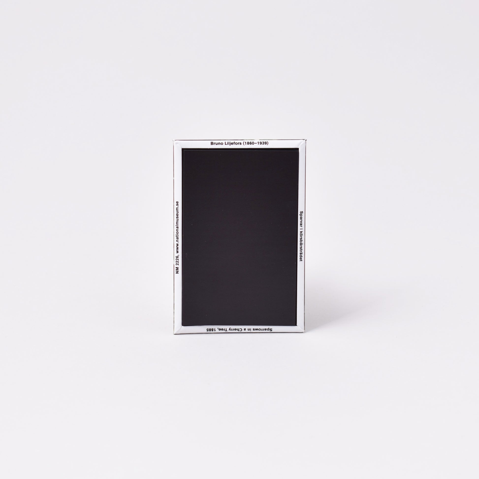 baksida av magnet med målning av Bruno Liljefors sparvar från Nationalmuseum