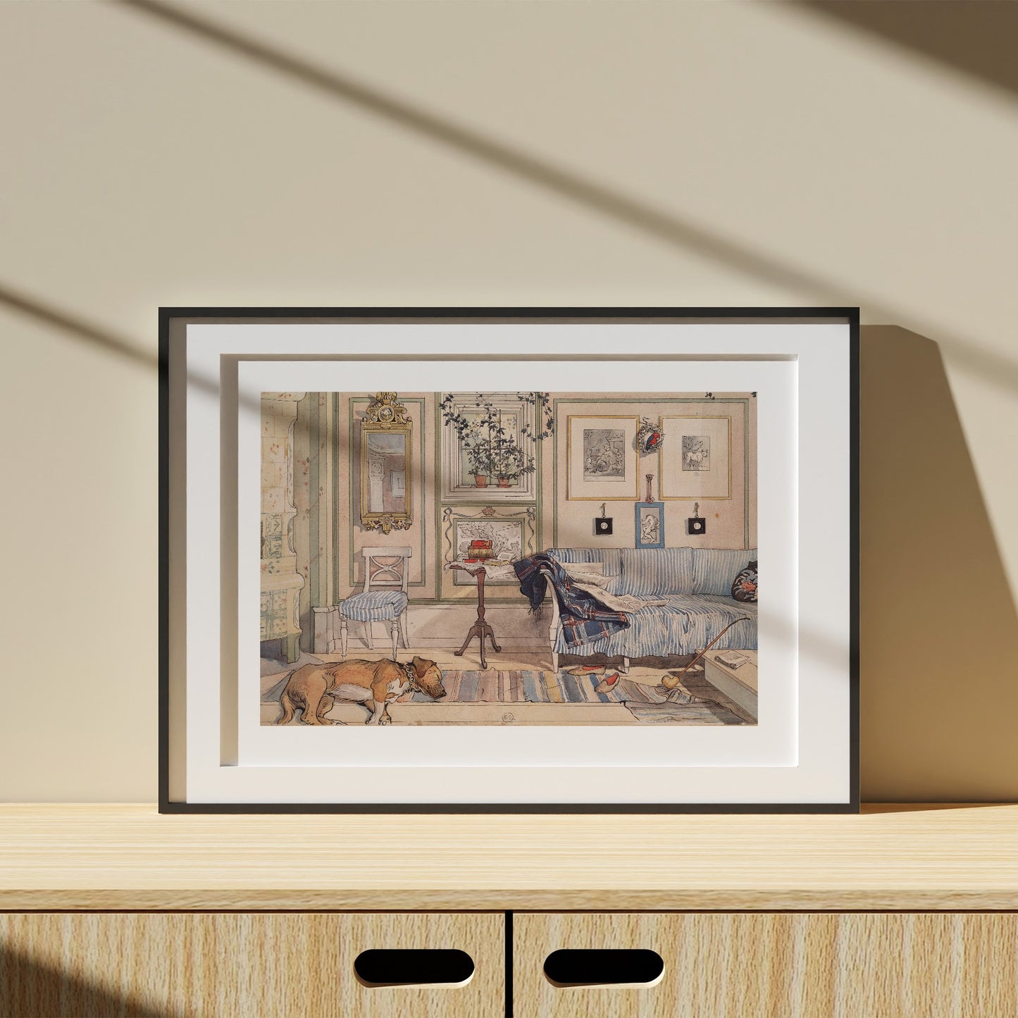 poster i svart ram med Carl Larssons akvarell Lathörnet från Nationalmuseum