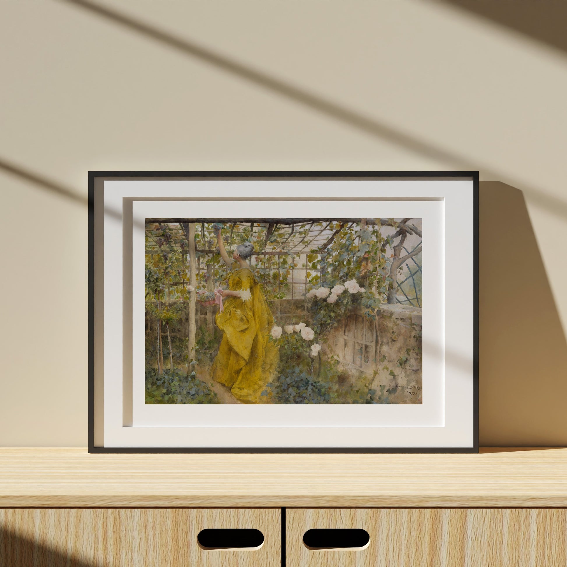 poster i svart ram med Carl Larssons Vinet från Nationalmuseum