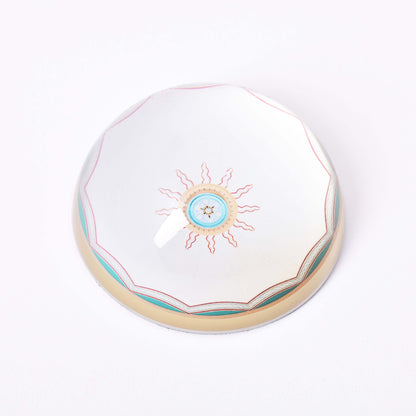 Brevpress i glas med motiv av takrosett i Överintendentens gamla kontor på Nationalmuseum