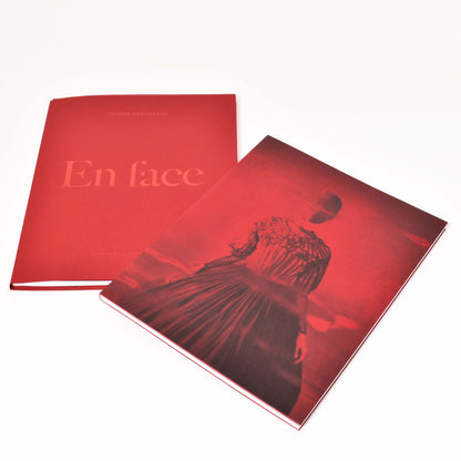 två volymer från boken en face