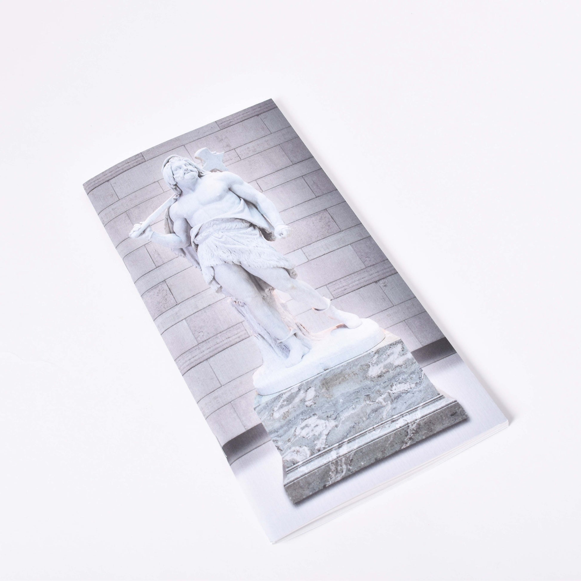 Skisshäfte med skulpturen Tor från NAtionalmuseums skulpturgård