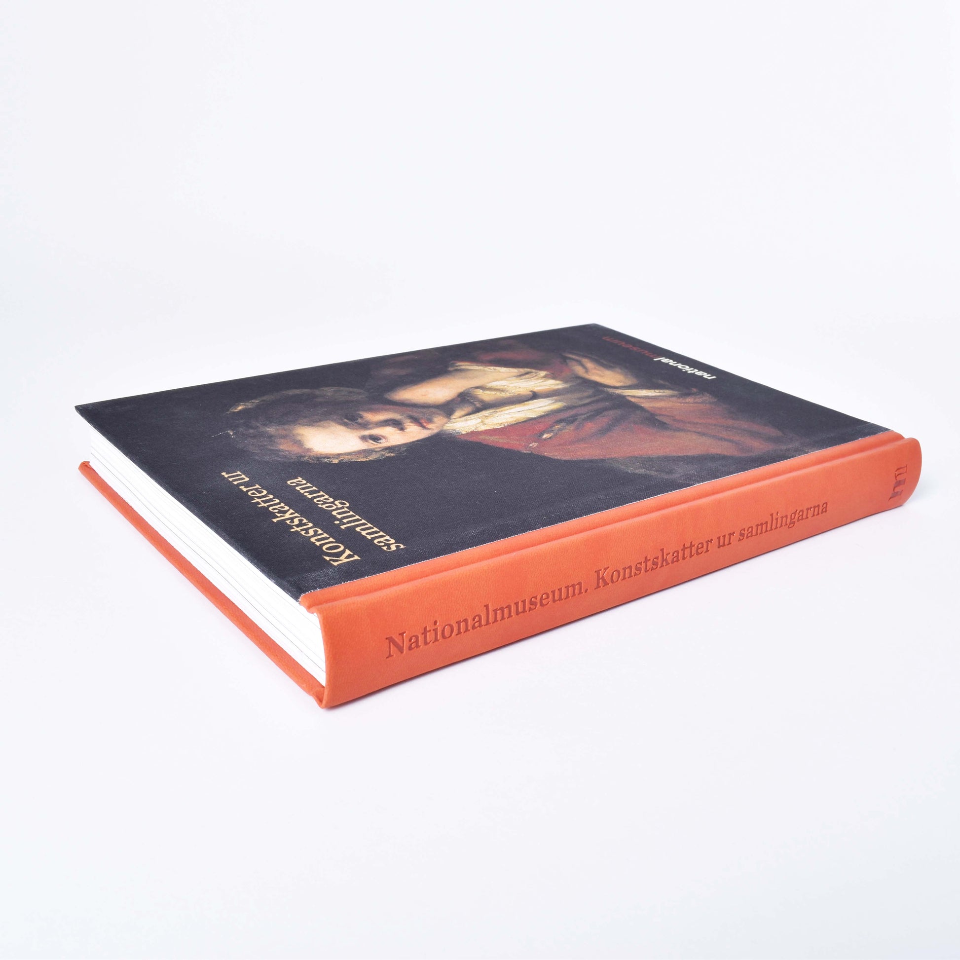 boken konstskatter i samlingarna av nationalmuseum med motivet kökspigan och rygg i läder