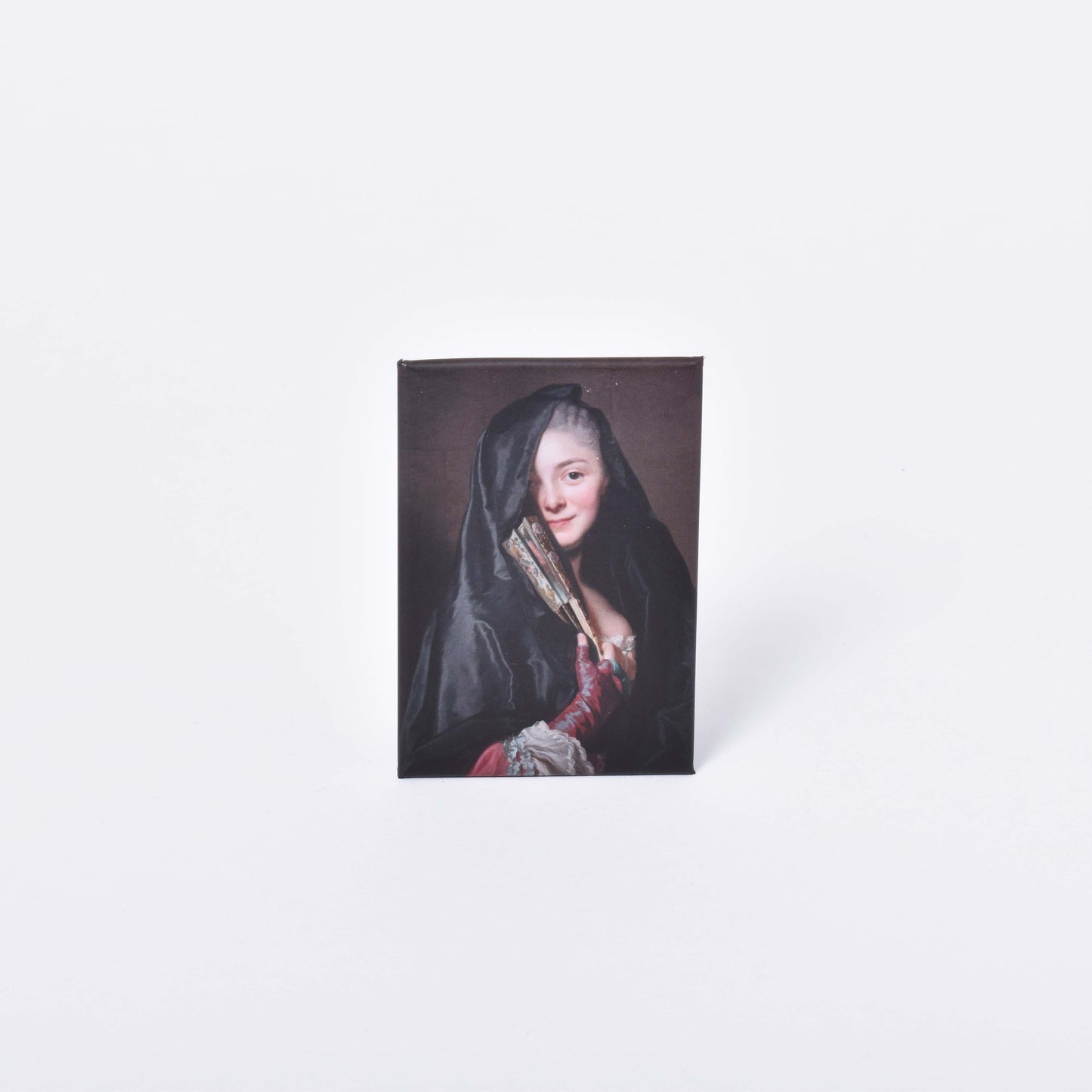 magnet-damen med slöjan