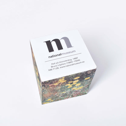 block för anteckningar med vita ark och motiv av bruno liljefors