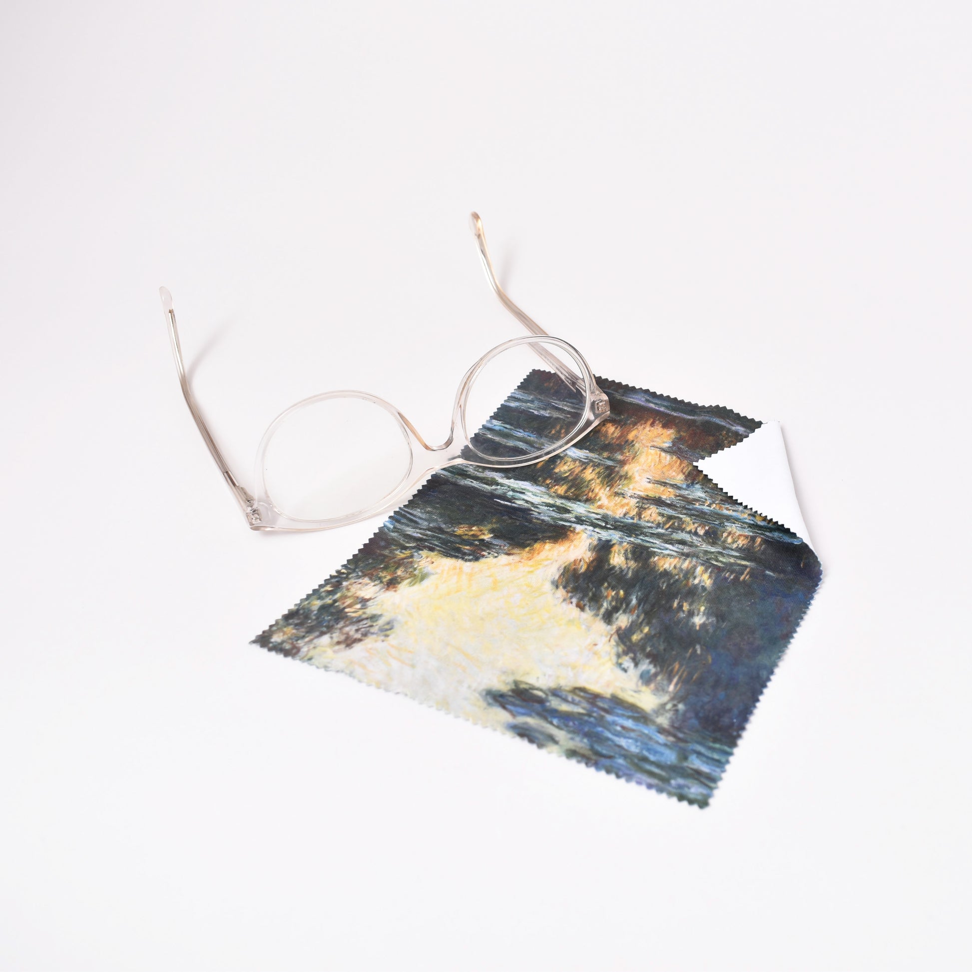 Putsduk med näckrosor och glasögon